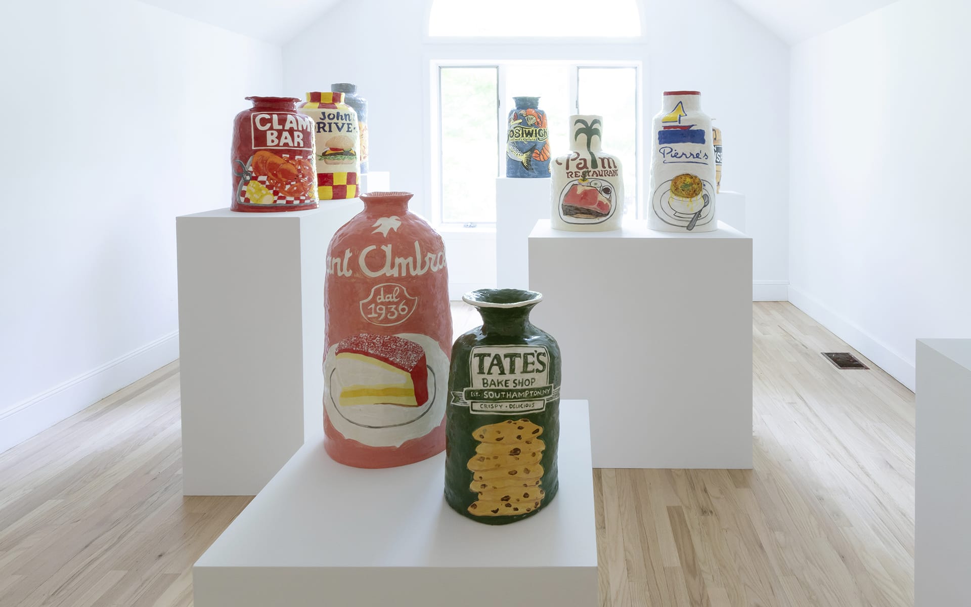 Installation view of the A Hug from the Art World's popup in East Hampton, featuring work by Jake Clark.