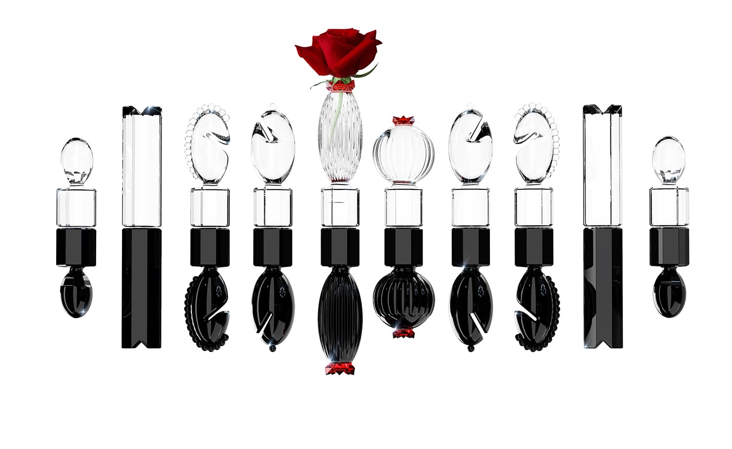 Assorted black chess pieces with clear tops, arranged in a row, with a red rose above the center piece.