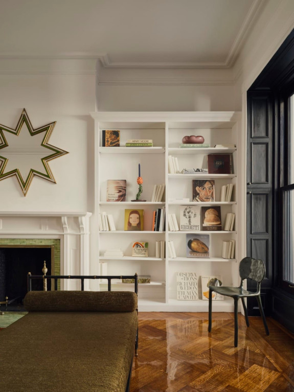 One of two beds by Jacques Adnet on the second floor.