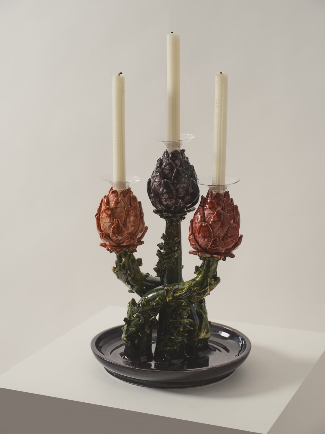 A hand-painted ceramic candelabra by Lola Montes.