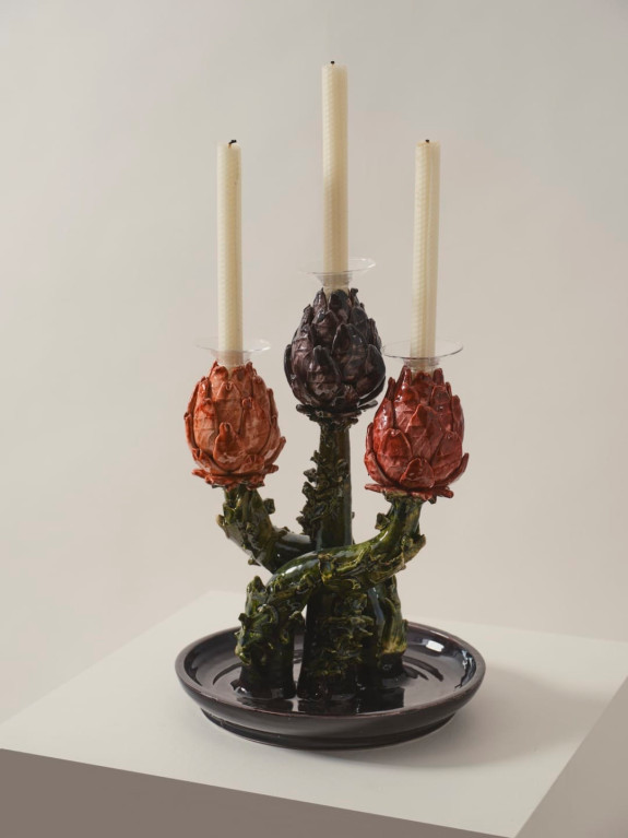 A hand-painted ceramic candelabra by Lola Montes.