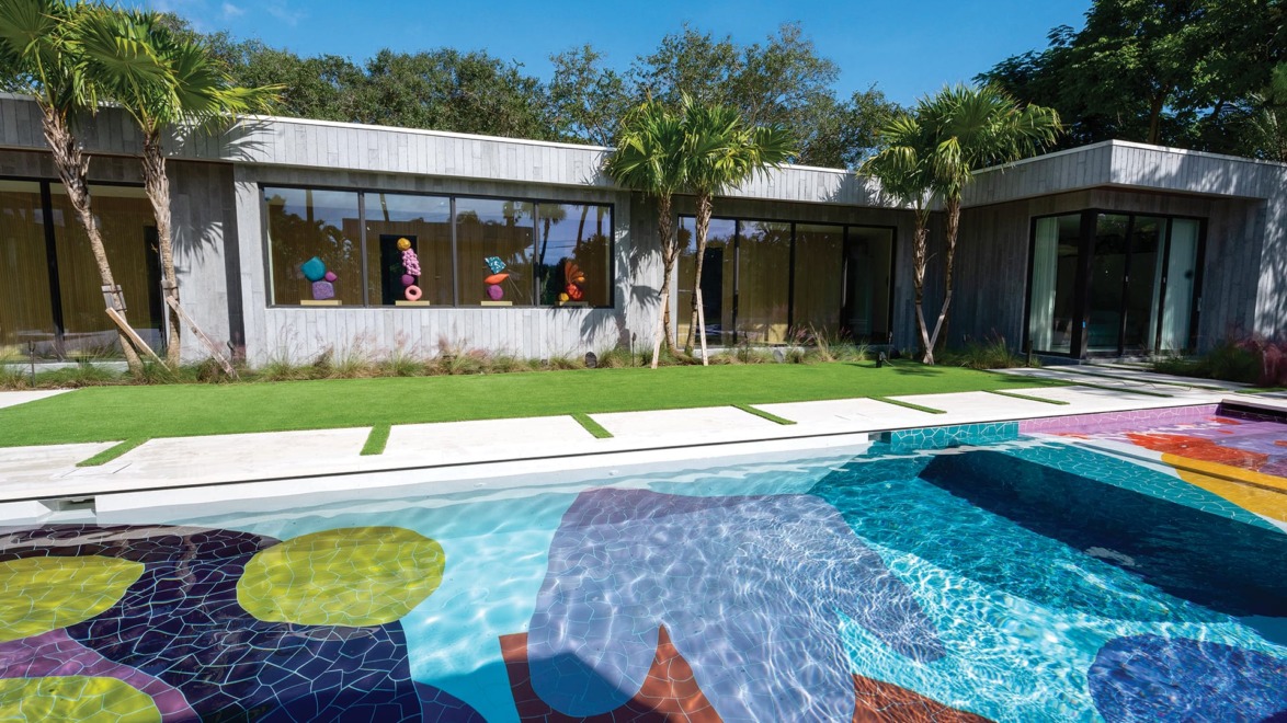 A pool in Miami with ceramic tile work designed by Alex Proba.