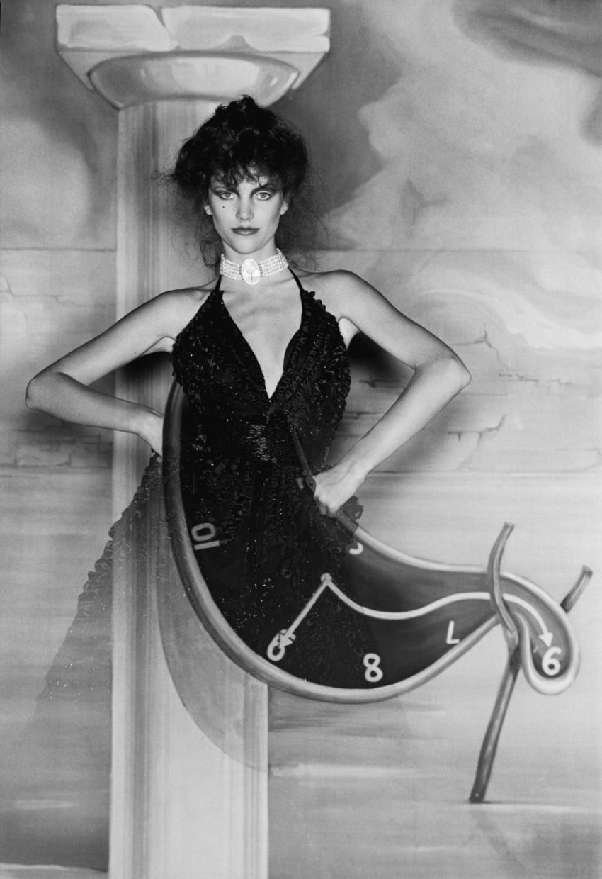 Portrait of a woman in a surreal setting with a melting clock illustration on her dress, inspired by Salvador Dalí.