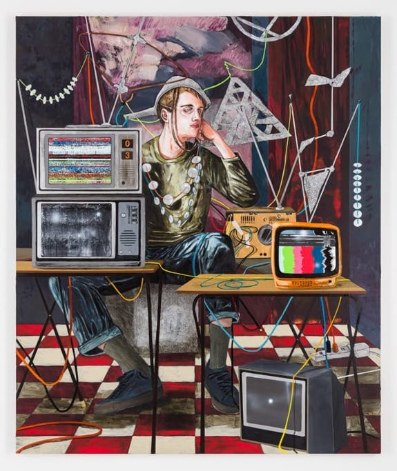 Man sitting with vintage TVs and electronic gadgets; abstract art style with vibrant colors and geometric shapes in background.
