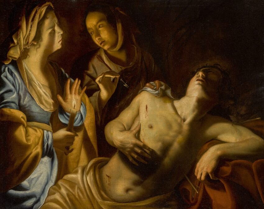 Two women in dramatic lighting holding a knife next to a wounded person in historical attire.