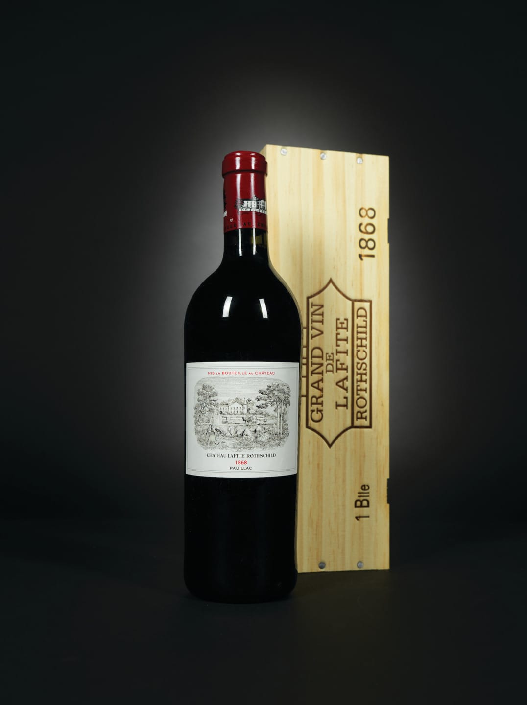 Bottle of red wine labeled "Château Lafite Rothschild" with a wooden box labeled "Grand Vin de Lafite Rothschild 1868".
