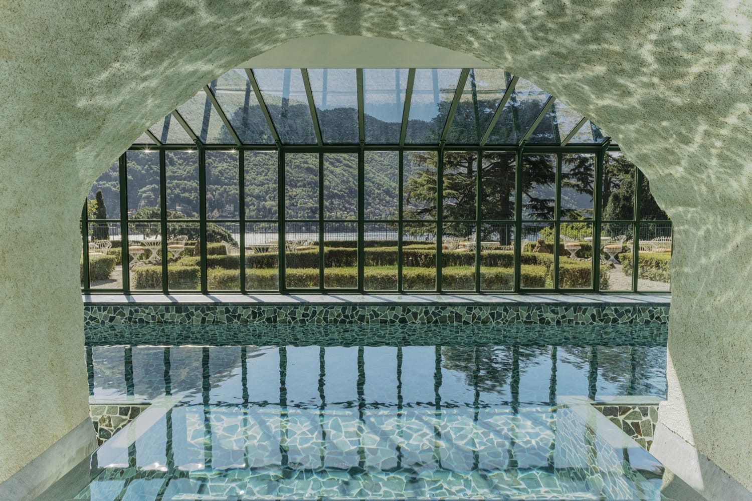 The wellness facilities include an 18-meter pool inside a historic greenhouse.