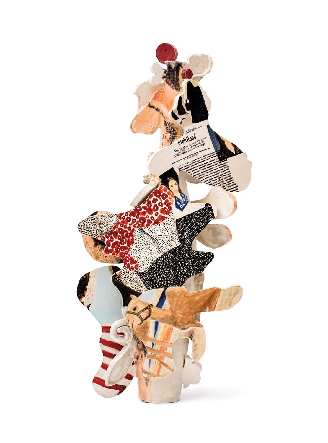 Abstract sculpture with layered, colorful paper cutouts forming a vertical collage of various patterns and textures.