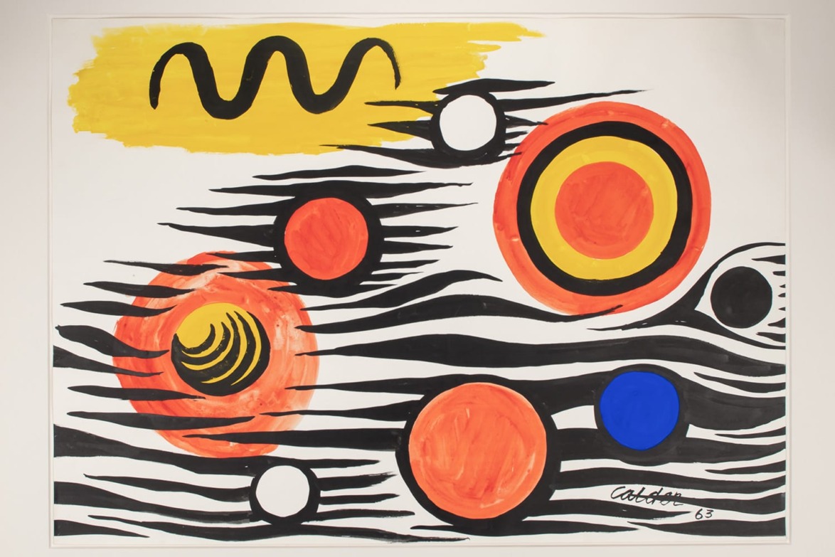 Abstract art with bold black zigzag lines, yellow and orange circular shapes, and blue accents on a white background.