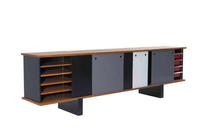 Modular wooden sideboard with open shelves, sliding panels, and colorful compartments, resting on two black legs.
