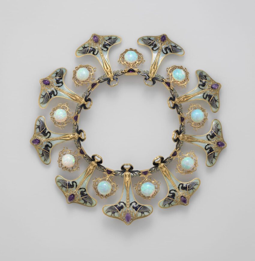 Art Nouveau style gold necklace with opals and butterfly-shaped enamel designs arranged in a circular pattern.