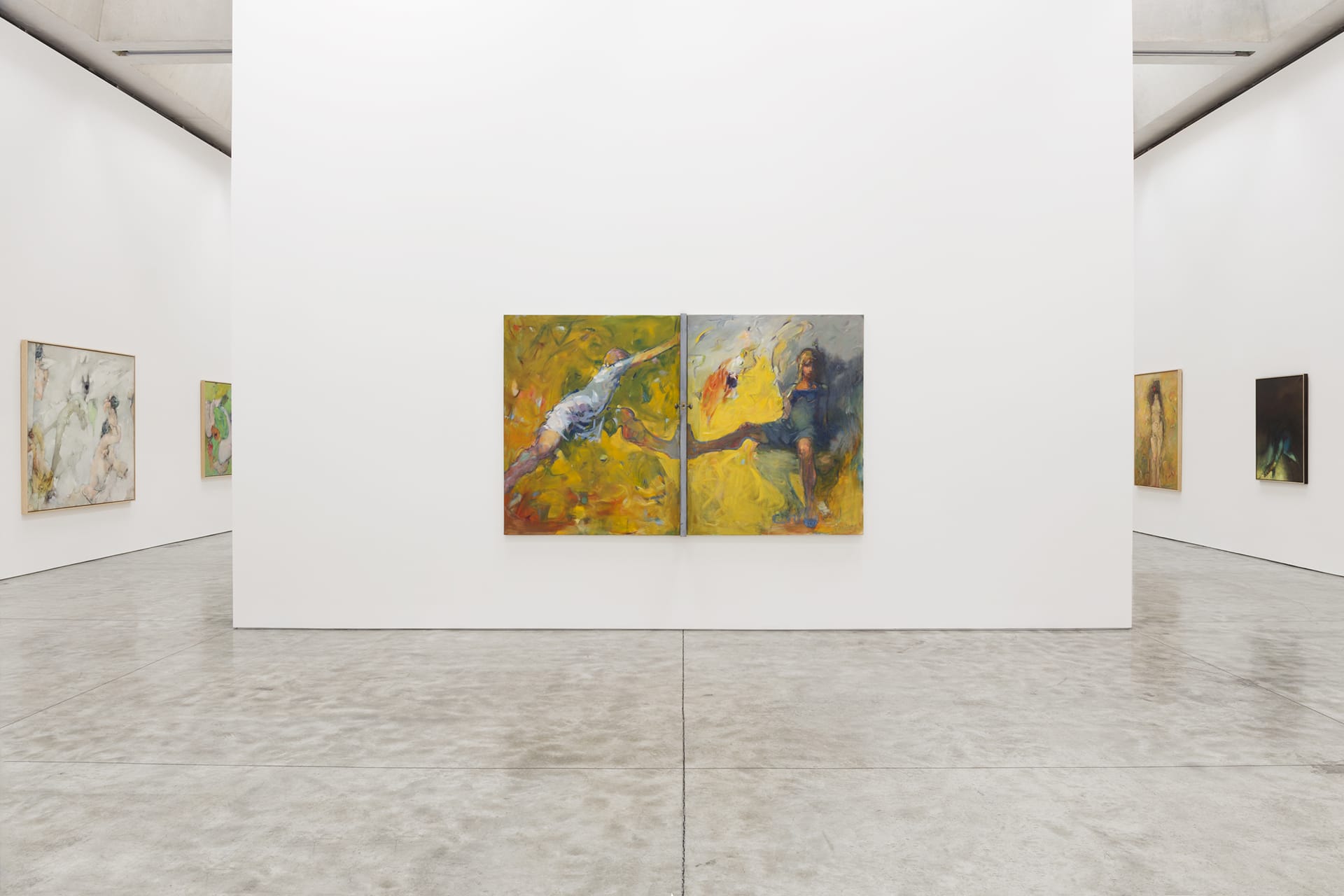 Art gallery interior with large paintings on white walls and a polished concrete floor.