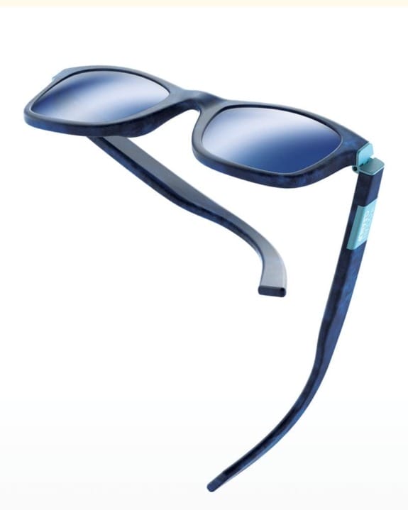 Blue sunglasses with reflective lenses and sleek design, angled view against a white background.