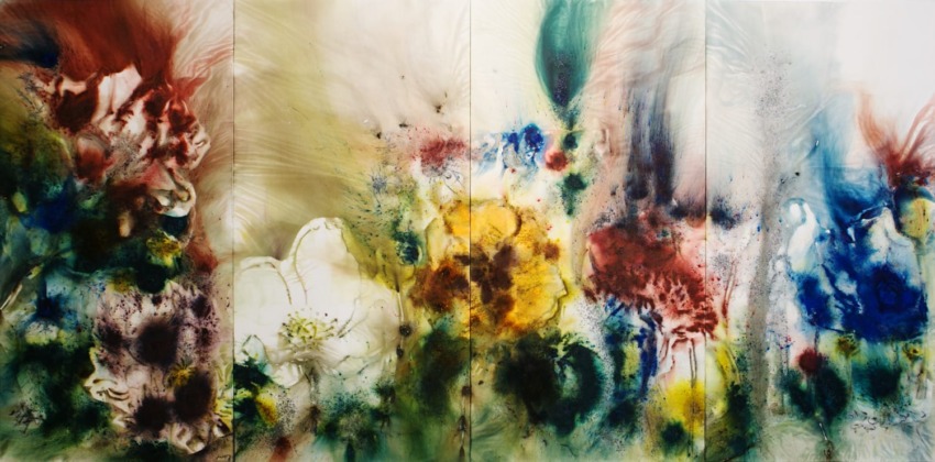 Abstract floral painting with vibrant splashes of red, yellow, blue, and green hues blending in a dynamic pattern.