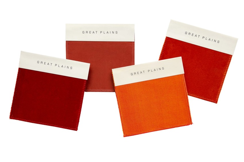 Four fabric swatches in red and orange shades labeled Great Plains on a white background.