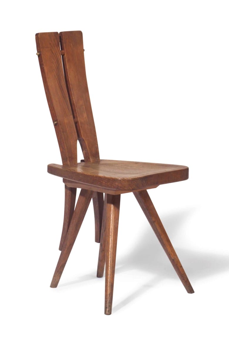 Wooden chair with a minimalist design featuring a high backrest and angled legs on a white background.