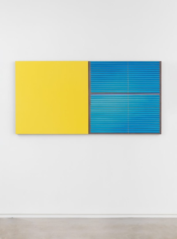 Abstract art piece with a vibrant yellow panel on the left and a textured blue panel with lines on the right.