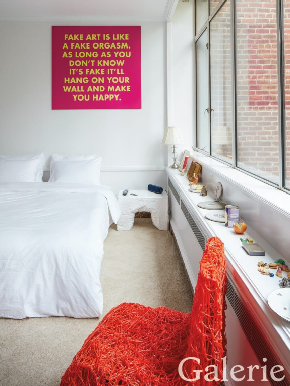 Schachter installed one of his own text photos above his bed and a Max Lamb side table; the objects on the window ledge include pieces by Richard Prince, Rachel Harrison, and Urara Tsuchiya, and the extruded-plastic chair is by Tom Dixon.