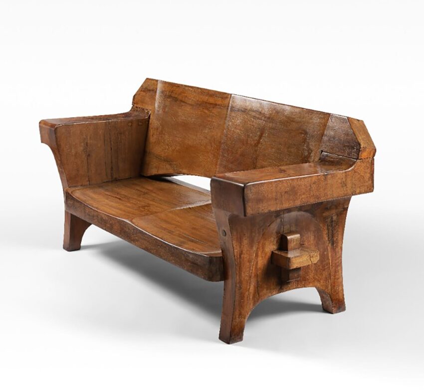 Wooden bench with a rustic design and built-in cup holders on the armrests, featuring a natural finish and angular backrest.