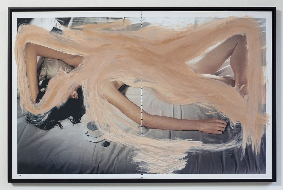 Abstract art piece with beige brush strokes overlaying an image of a person lying in bed on white sheets.