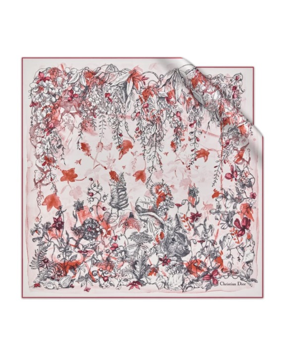 Illustrated scarf with floral and foliage motifs in red and black shades, featuring intricate nature-inspired patterns.