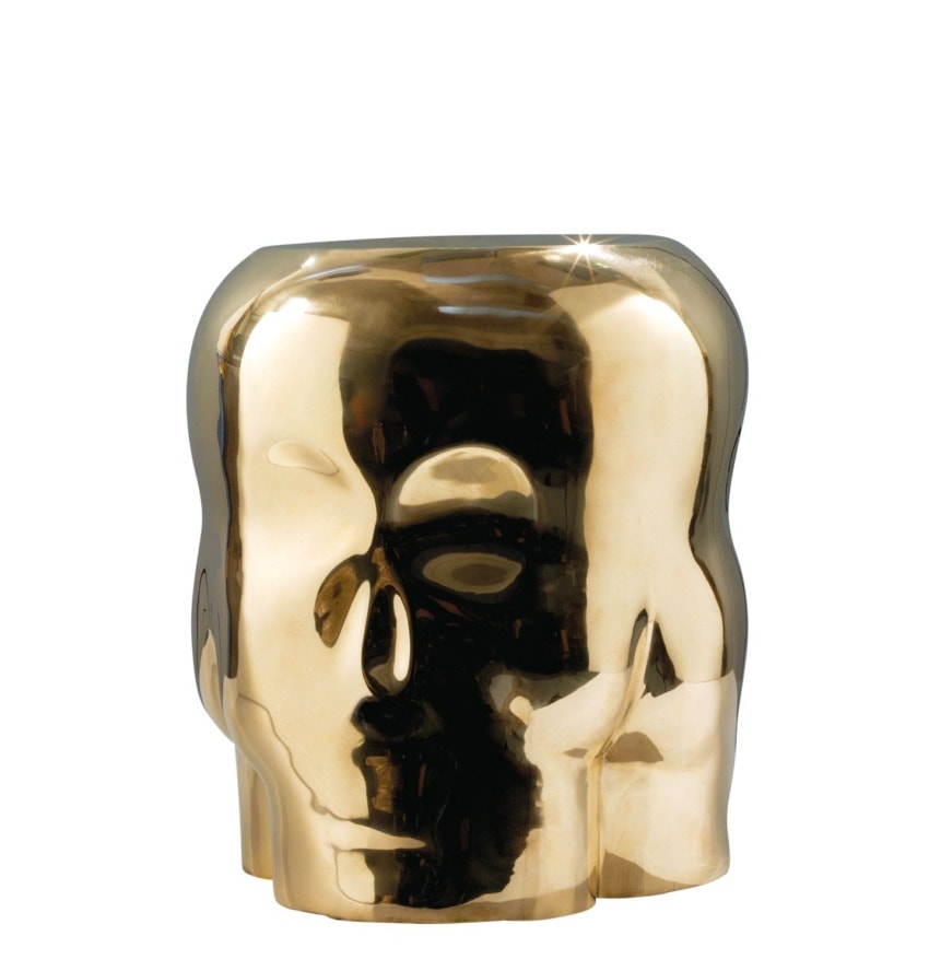 Gold-colored skull-shaped ceramic vase with a reflective surface and hollow top opening for decor or floral arrangements.