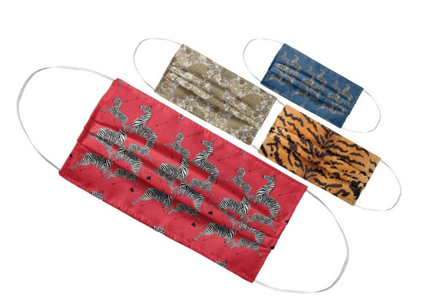 Four decorative face masks with zebra, camouflage, blue dolphin, and tiger stripe patterns displayed on a white background.