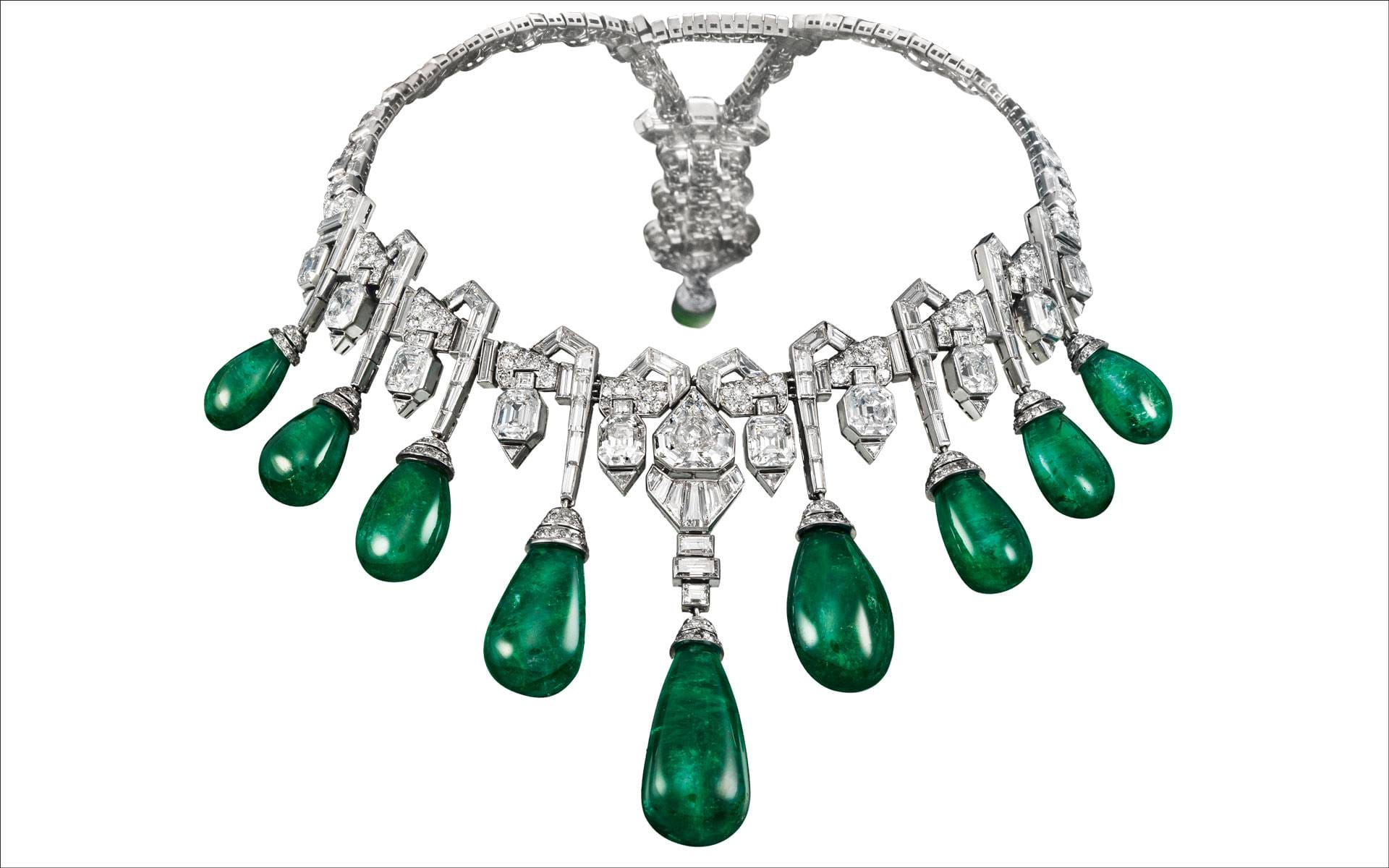 Art Deco necklace with emerald teardrops and diamond detailing.