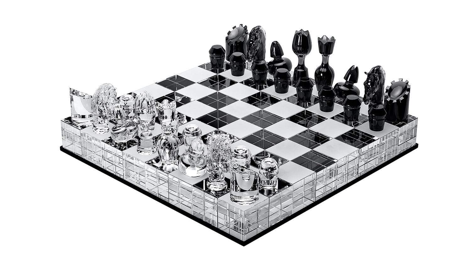 Luxurious glass and mirrored chess set with intricately designed pieces on a reflective board.