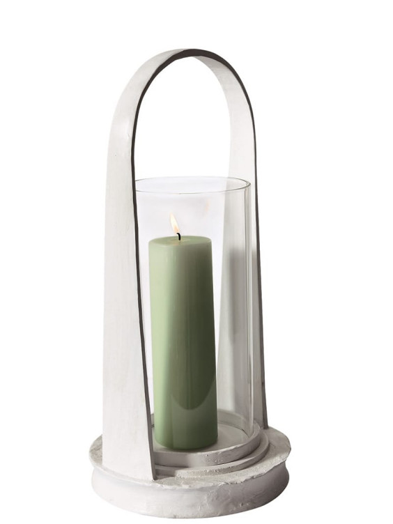 Elegant lantern with a green candle inside, encased in a glass cylinder surrounded by a white metal frame.