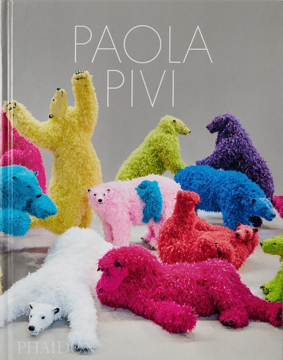 Colorful furry animal sculptures of various shapes and sizes on a book cover titled "Paola Pivi" by Phaidon.