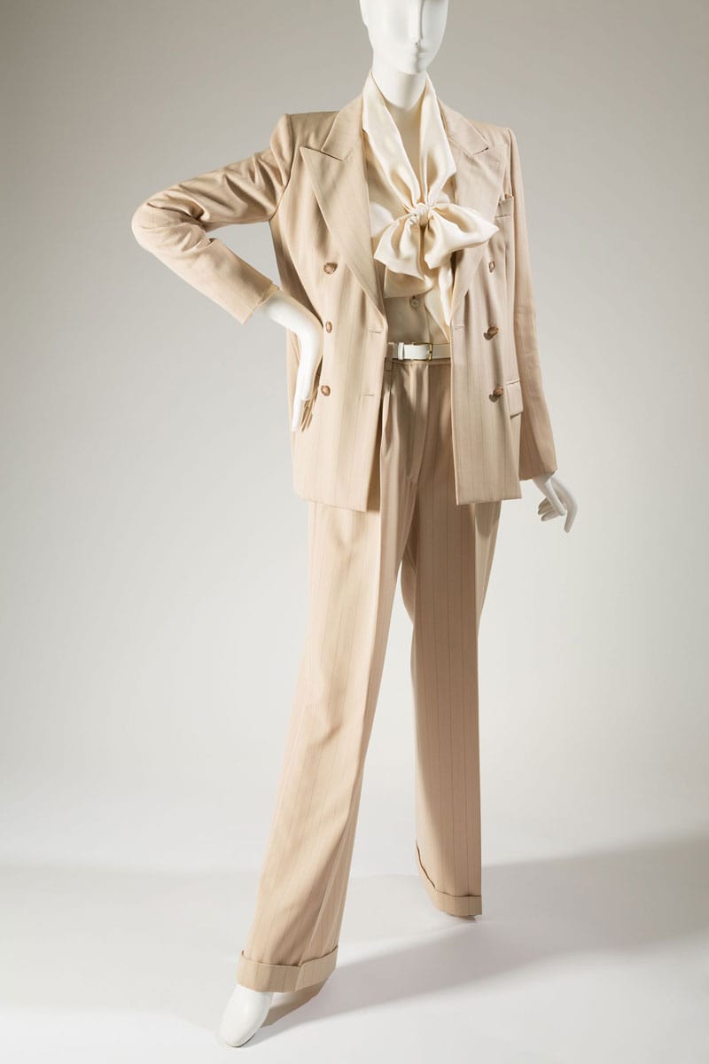 Yves Saint Laurent 1979 suit was gifted to the museum by Lauren Bacall.
