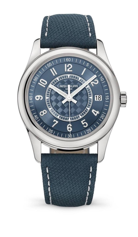 Luxury watch with a blue dial and strap, featuring a silver bezel and date display at 3 o'clock position.