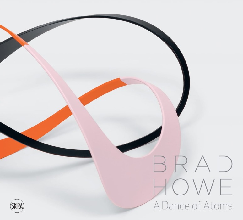Abstract sculpture with intertwined pink, orange, and black ribbons on white background, featuring text: Brad Howe, A Dance of Atoms.
