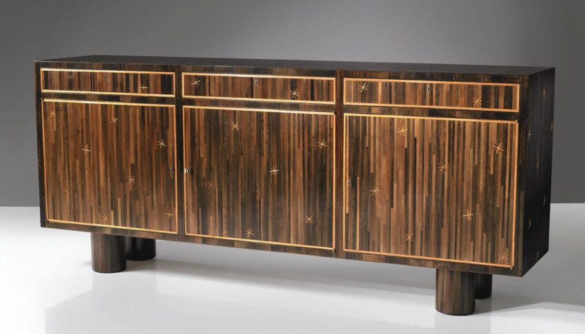 Wooden sideboard with star inlay detailing, featuring a dark finish and modern design, set against a plain grey background.