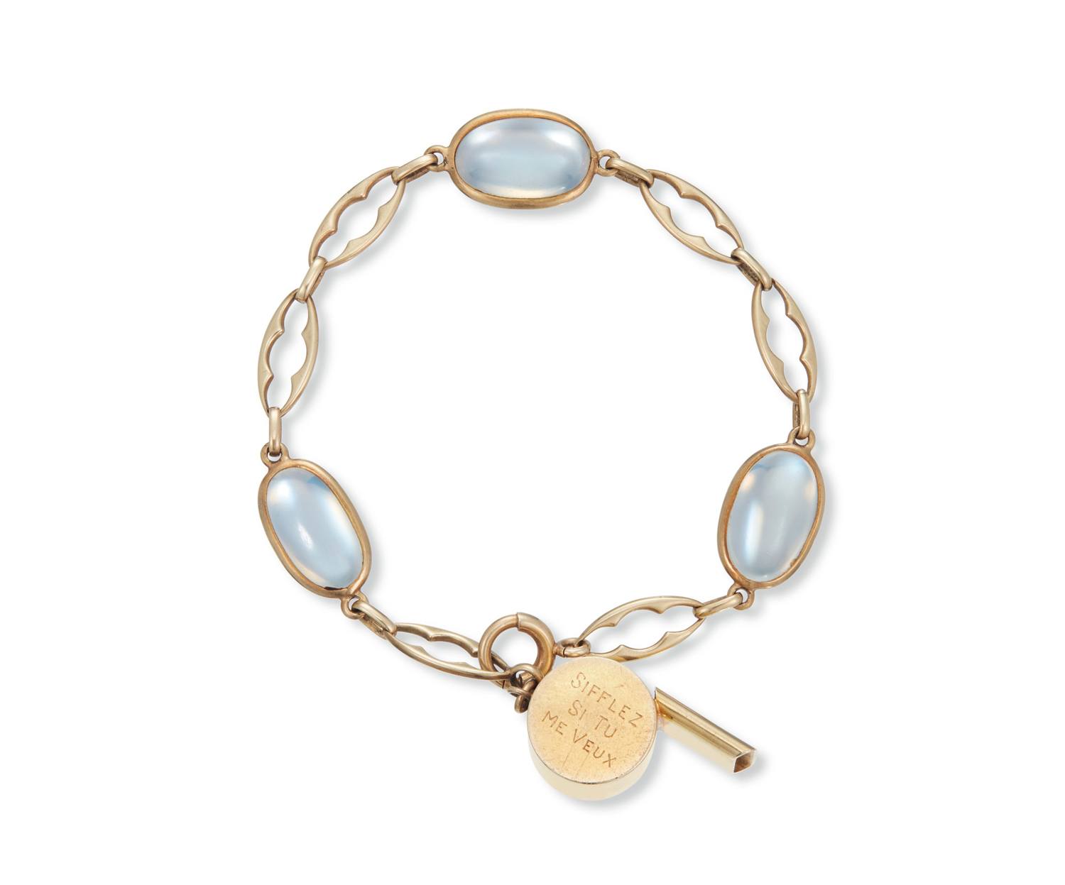 Gold bracelet with blue oval stones, featuring a key and a round engraved charm.