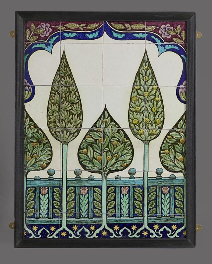 Decorative ceramic tiles featuring intricate floral patterns with tall trees and vibrant blue and green colors.