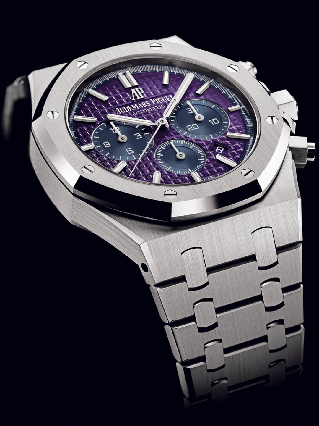 Stainless steel luxury watch with a blue dial and chronograph features on a black background.