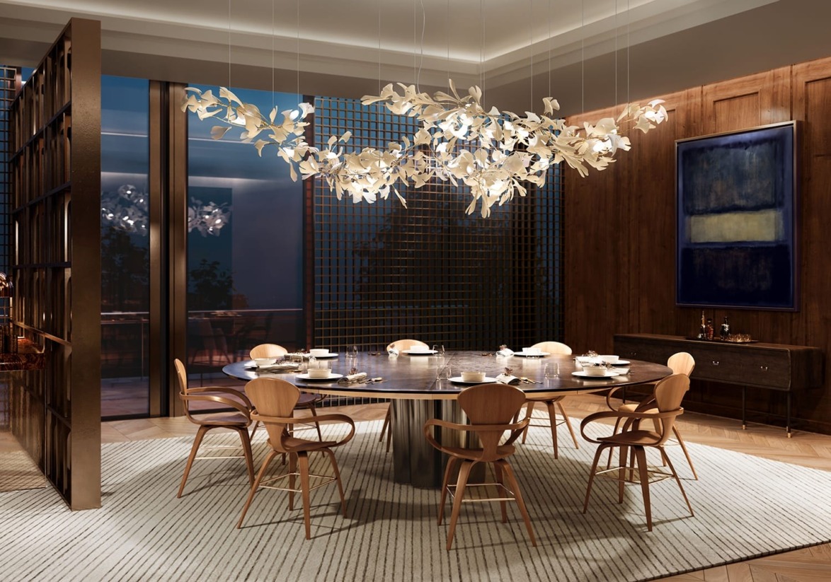 Elegant dining room with a round table, wooden chairs, decorative chandelier, and modern art on the wall.