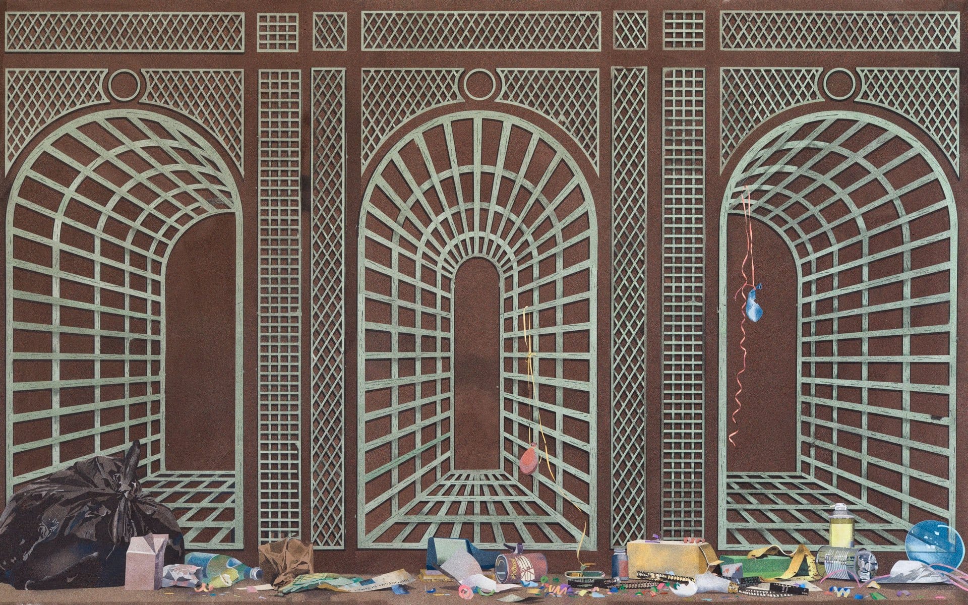 Colorful street art with geometric arches and various items scattered on the ground in front of an intricate wall pattern.