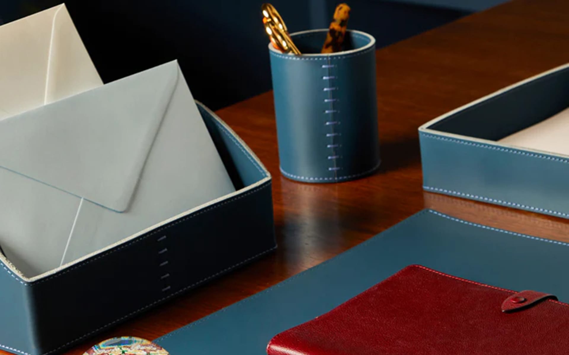 Rabitti 1969's famous Todi leather set is on the list of office essentials.