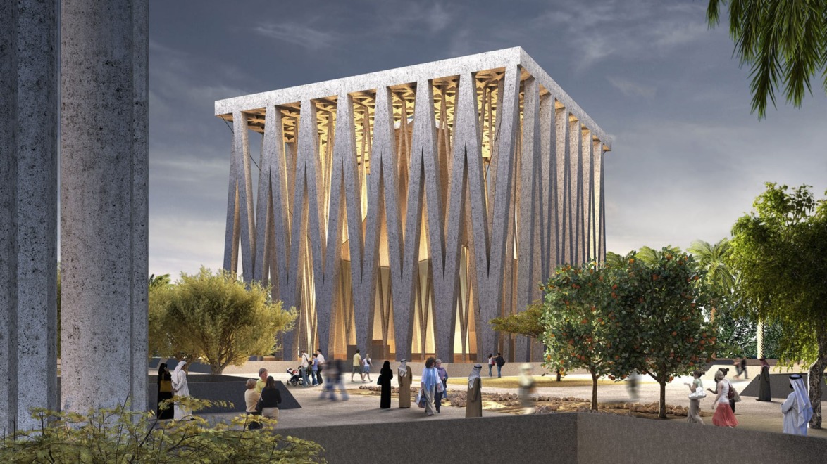 Modern architectural building with tall columns and trees, people walking nearby, under a partly cloudy sky.