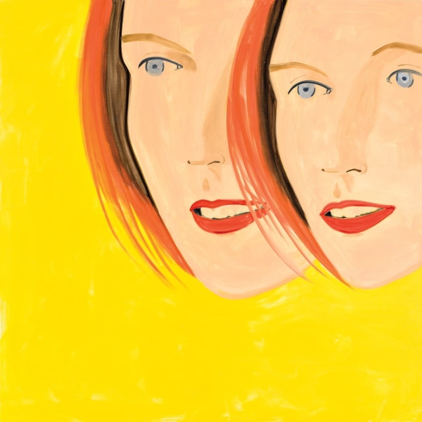 Painting of two abstract faces with red hair on a bright yellow background, featuring blue eyes and red lips.