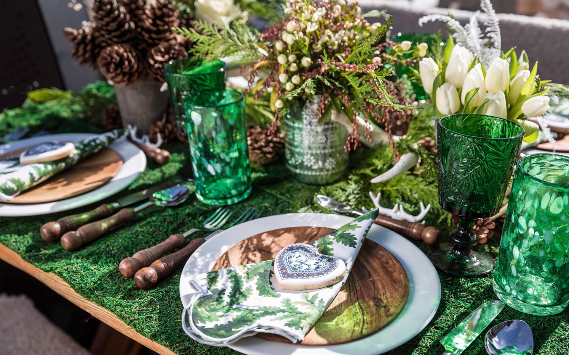 Alpine Affair: Create a Tyrolean “forest floor” tablescape using pinecones and greenery—with hearty winter soups and German sweets to complete the cozy scene.