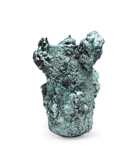 Textured turquoise ceramic vase with rough, uneven surface and natural, organic shape against a white background.