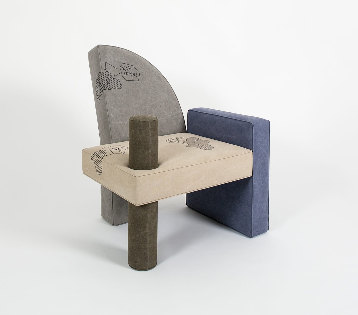 Modern abstract chair with unique geometric shapes and artistic designs on upholstery.