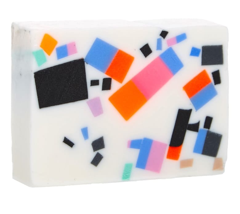Colorful geometric shapes embedded in a white rectangular block.