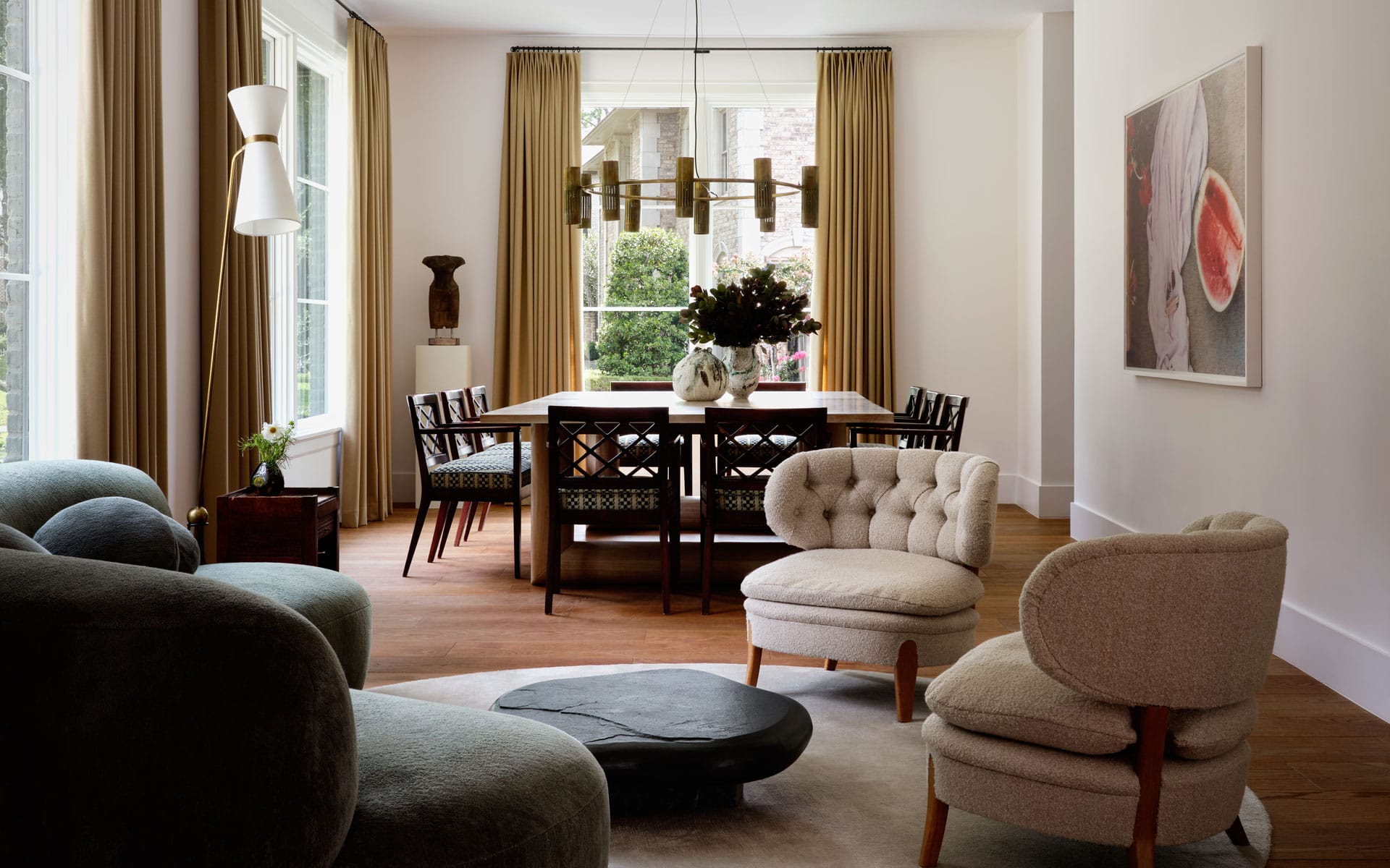 Brandon Fontenot chose a sofa by Pierre Augustin Rose in a Pierre Frey chenilee, lounge chairs by Otto Shultz; Denmark 1940s, and a lamp by Pierre Guariche.