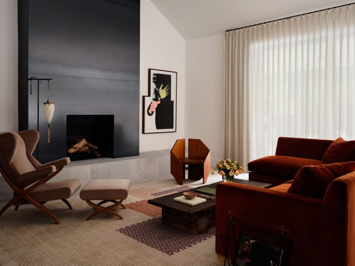 Brandon Fontenot chose a sofa by After Jean-Michel Frank covered in Rose Uniacke corduroy, a chair and ottoman by Franco Albini, a lamp by Fortvny, and art by John Baldessari.