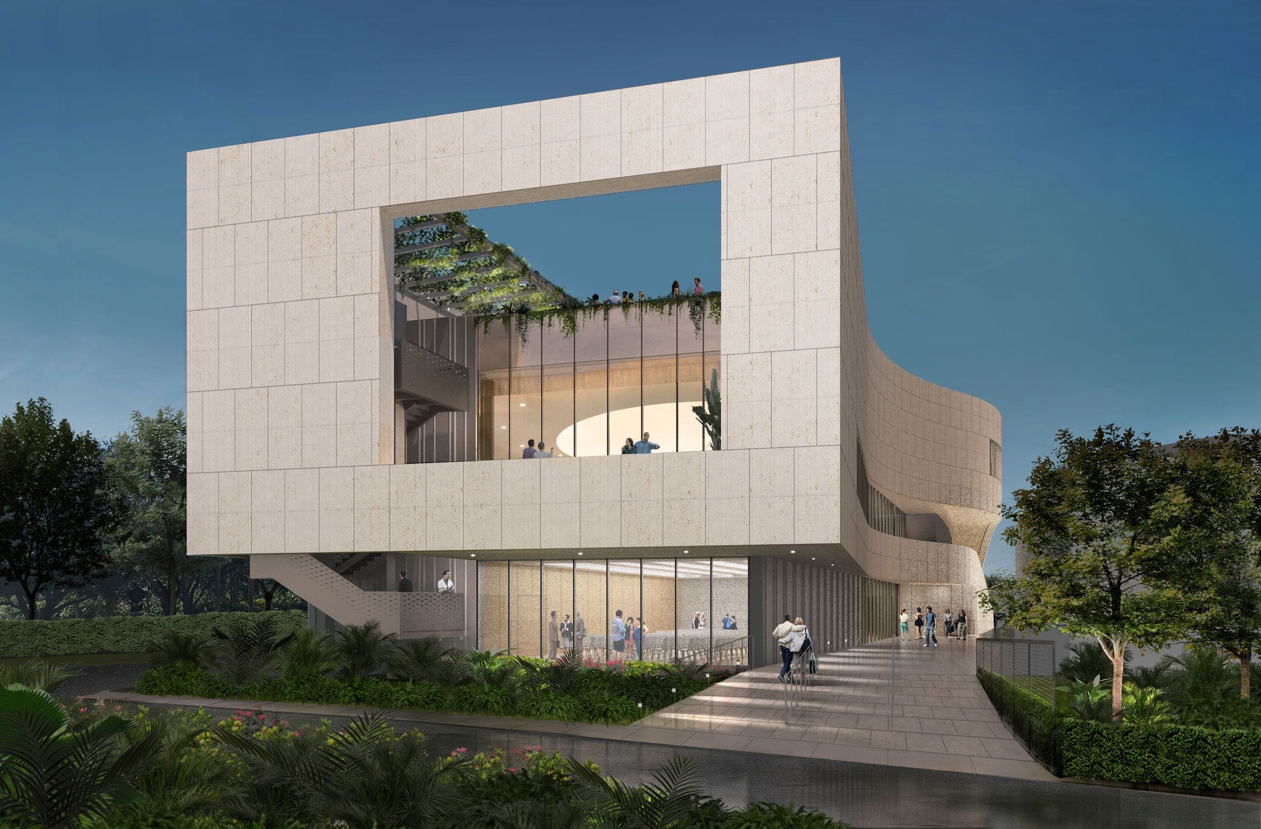 Modern architectural building with large windows and rooftop garden, surrounded by trees and greenery under a clear sky.